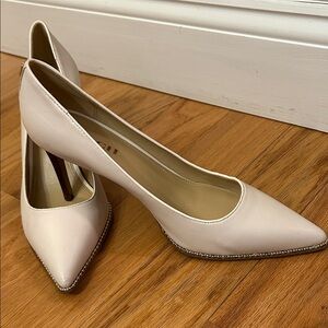 COACH- Elegant Women's Ivory Pointed-Toe Heels with Gold Trim
